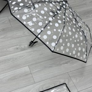 Paraguas transparente circulos