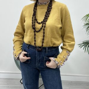 Jersey puntilla flor mostaza