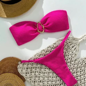 TRAJE DE BAÑO FUCSIA SEMIHILO CON ARO DORADO